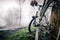 Mountain bike and helmet in autumn woods