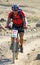 Mountain bike racer in desert