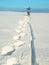 Mountain bike stay in deep snowdrift. Rear wheel detail. Snow on tyre