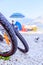 Mountain bike tyres on the beach, copy space