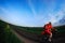 Mountain bikeer rides on the trail against beautiful sunset