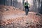 Mountain biker on cycle trail in woods