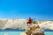 Mountain biker looking at mountains and beach