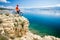 Mountain biker looking at view and sea