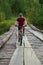 Mountain biker on old wooden bridge