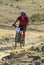 Mountain biker racing in desert