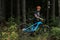 Mountain biker riding on bike in autumn inspirational mountains landscape banner. Man cycling MTB on enduro trail track. Sport