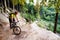 Mountain biker riding cycling in autumn forest