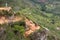 Mountain biker riding dangerous trail down to Chicamocha Canyon, Colombia