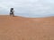 Mountain biker riding downhill the famous Slickrock trail, Moab, USA