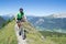 Mountain biker riding downhill in Swiss Alps