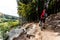 Mountain biker riding singletrack in autumn forest trail