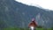 Mountain biker riding on trail in green forest