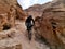 Mountain biker in the Timna valley mountains gorge