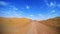 Mountain bikers riding the bike in a desert road