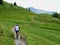 Mountain biking on gravel path in the Austrian Alps. Lech, Arlberg, Austria.