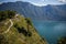 Mountain Biking on a narrow trail above Lake Garda