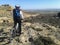 Mountain biking rider looking at desert