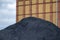 Mountain of black coal in a concept of energy crisis