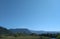 Mountain, and blue sky background.