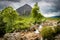 Mountain Buachaille Etive MÃ²r and rocky waterfall in Scotland