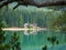 A mountain church reflected in the water of Lake Braies