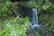 Mountain clear water flows on stones in the Carpathians