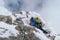 Mountain climber climbing the snow covered Alps in Mont Blanc Massif