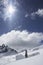 Mountain Climber Standing On Snowy Slope