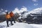 Mountain Climber Using Walkie Talkie By Friend On Snowy Peak