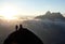 Mountain climbers on a rocky ridge at sunrise climbing Eiger mountain in the Swiss Alps