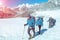 Mountain Climbers walking up on Glacier in weather protective Clothing