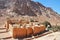 Mountain cloister landscape in the oasis desert valley. Saint Catherine`s Monastery in Sinai Peninsula