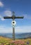 Mountain cross and alpine landscape, germany