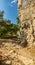 Mountain curved hiking track under vertical walls