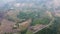 Mountain destroyed by human for cultivate plants. Aerial view of mountains covered in haze from burning forests. Areas with dense