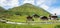 mountain farm huts beside a little creek, Dischma valley, Am Rhin, idyllic swiss landscape prattigau Davos