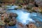 Mountain fast river with cold water, beautiful big stones