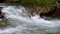 Mountain fast stream river with clear water.