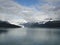 Mountain Filled horizon on the pacific ocean. Inside passage Alaska under a cloudy sky