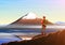Mountain Fuji with tourist, morning panoramic view with reflection on the lake kawaguchiko, peaks, landscape early in a