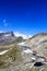 Mountain glacier panorama view with lake, summit Grossvenediger and Kristallwand, Hohe Tauern Alps, Austria