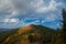 mountain hiking scene highland hill summer vibe landscape in slightly cloudscape weather day