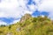 Mountain hill in the forest with blue sky and white cloud for hiking traveller at Chiangdao, Chiangmai, Thailand.