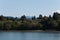 Mountain, houses, trees from Dungeness Spit, Olympic Peninsula, USA