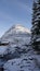 Mountain Hut and river on Trollstigen road in snow in Norway