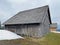 Mountain huts chalets or farmhouses and old wooden cattle houses in the valley of WÃ¤gital or Waegital and by the alpine Lake