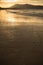 Mountain Jaizkibel backlit on atlantic coastline in beautiful golden sunset, hendaye, france