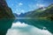 Mountain lake Oldenvatnet with the glacier Briksdal in Norway.