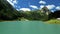 Mountain lake Schlierersee, Austria. lake and mountains covered with pine trees on blue sky background.Beautiful